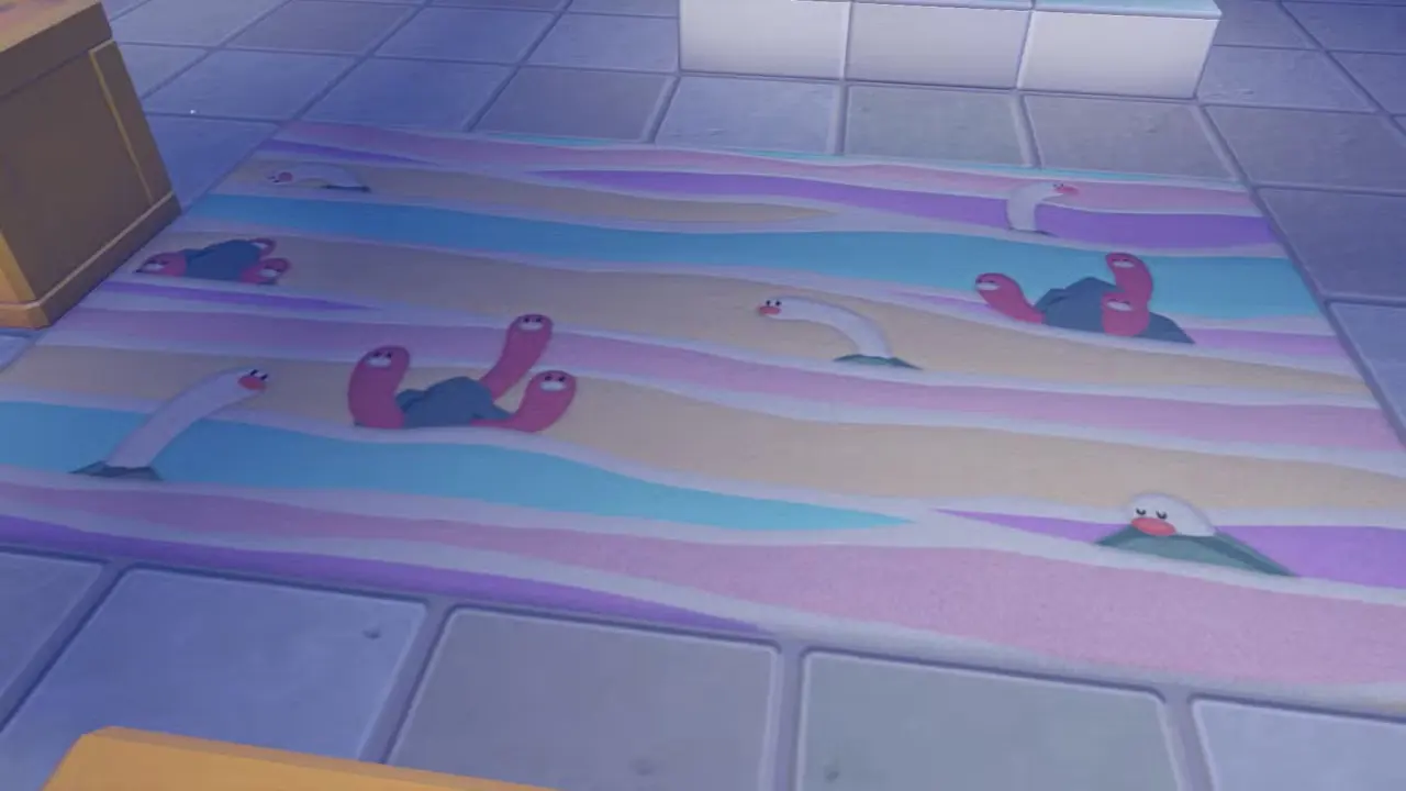 A rug with colored sand dunes on them featuring Wiglett and Wugtrio in Pokopia