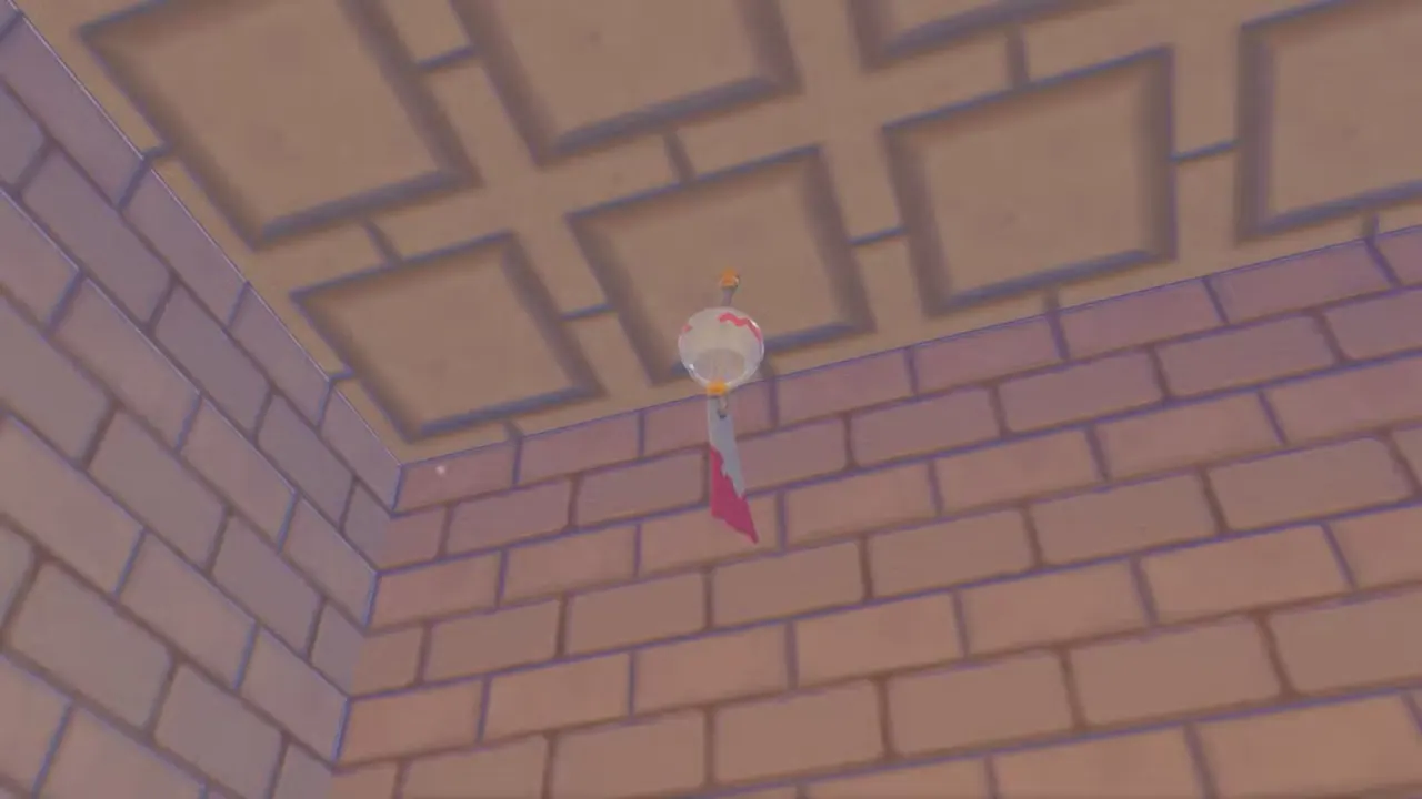 A Chimecho wind chime hanging from the ceiling in Pokopia