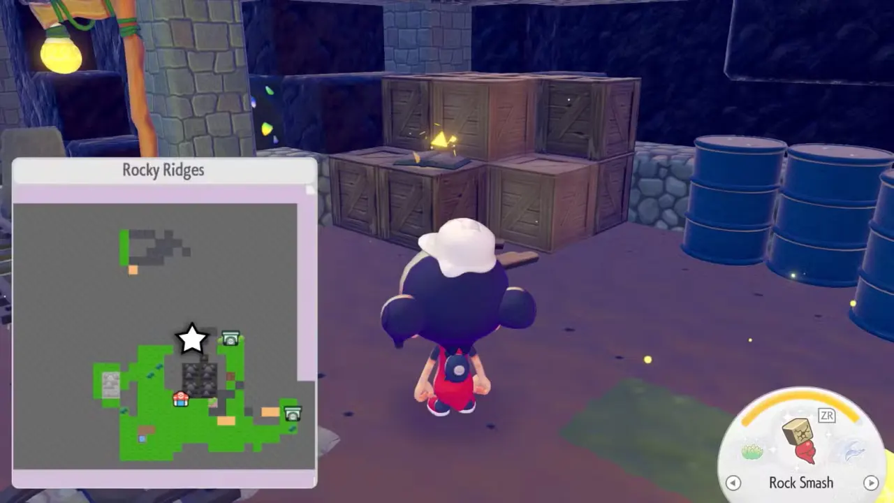 A book sitting on top of a bunch of crates in Pokopia.
