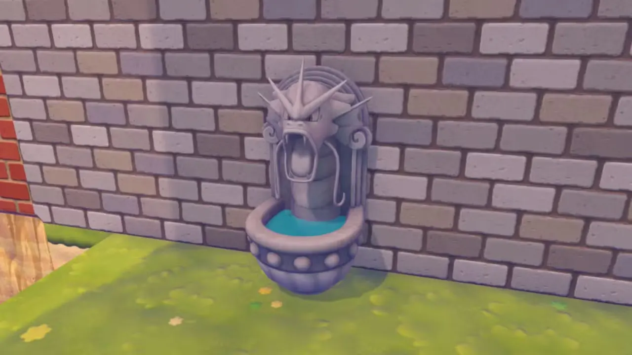 A Pokémon Pokopia screenshot showing the gyarados fountain