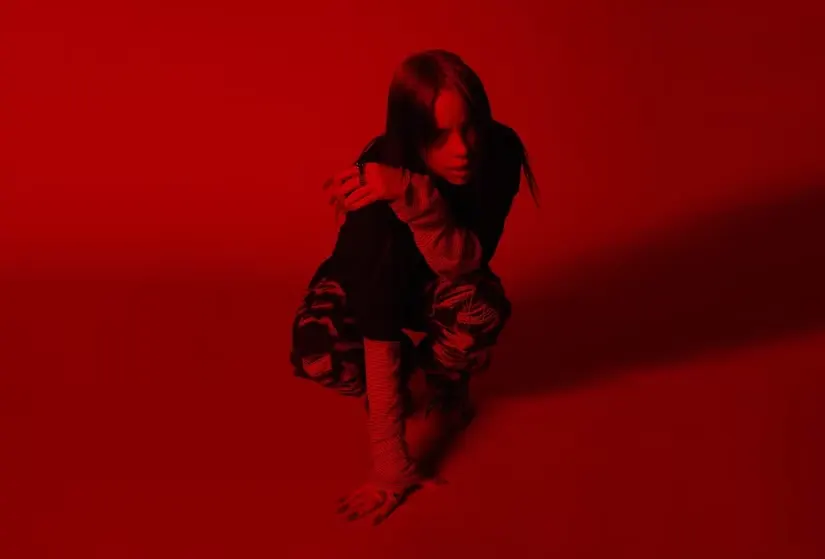 billie eilish in red lighting