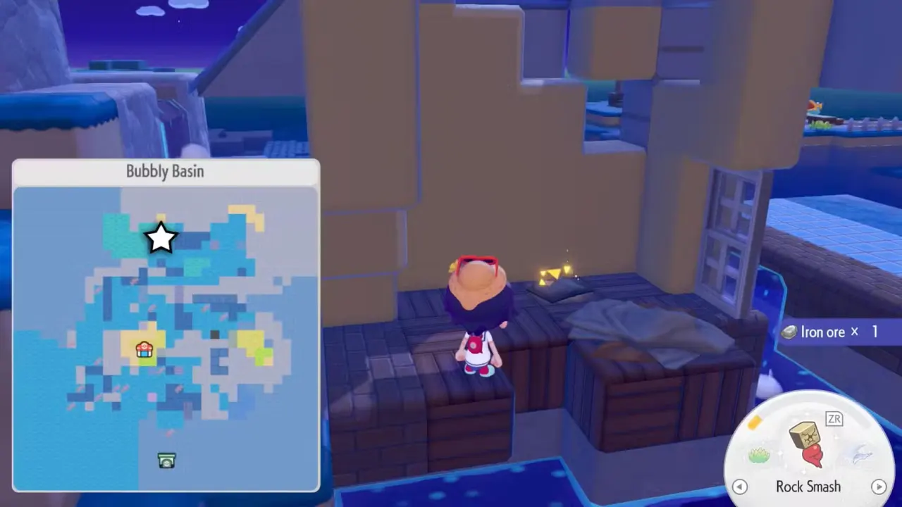 Ditto approaches a glowing book in a broken half of a building in Pokopia
