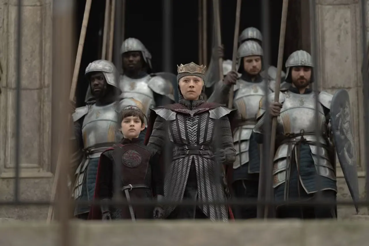 Prince Joffrey Velaryon (Oscar Eskinazi) stands next to his mother Rhaenyra (Emma D'arcy) in House of the Dragon