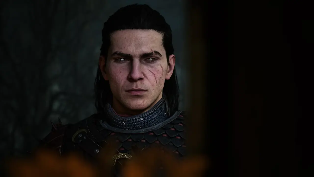 Coen looking pale and scarred with shiny vampire eyes